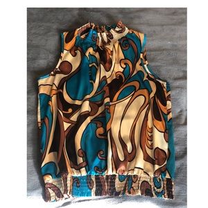 Women’s Sleeveless Satin Feel Shirt Size Medium.